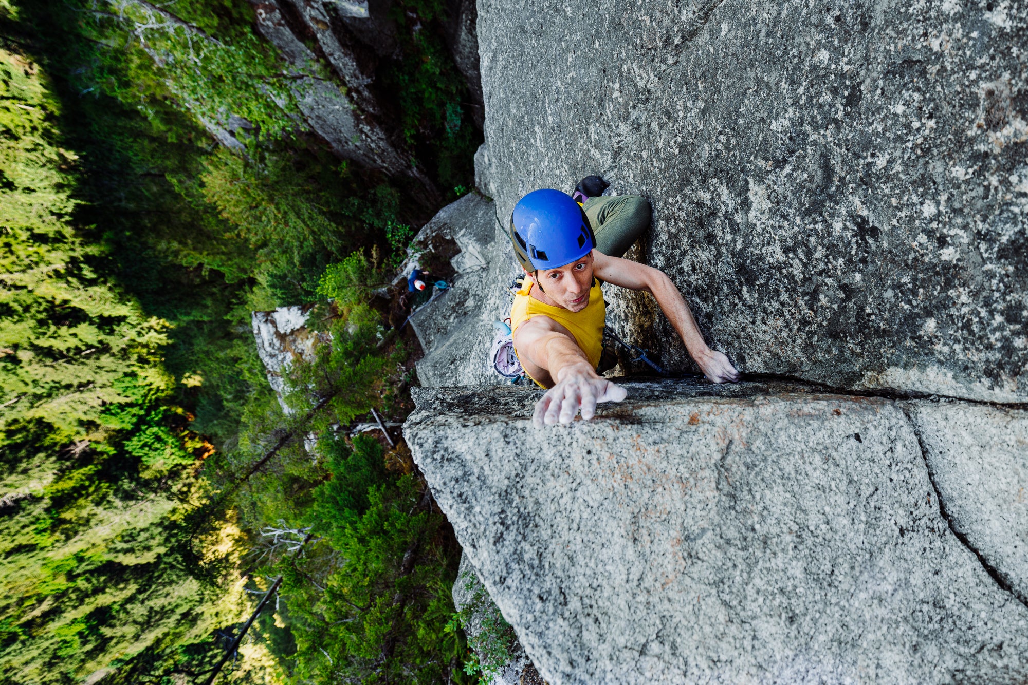 Luc Kennedy reaches for the final hold atop the crux sequence on P6.