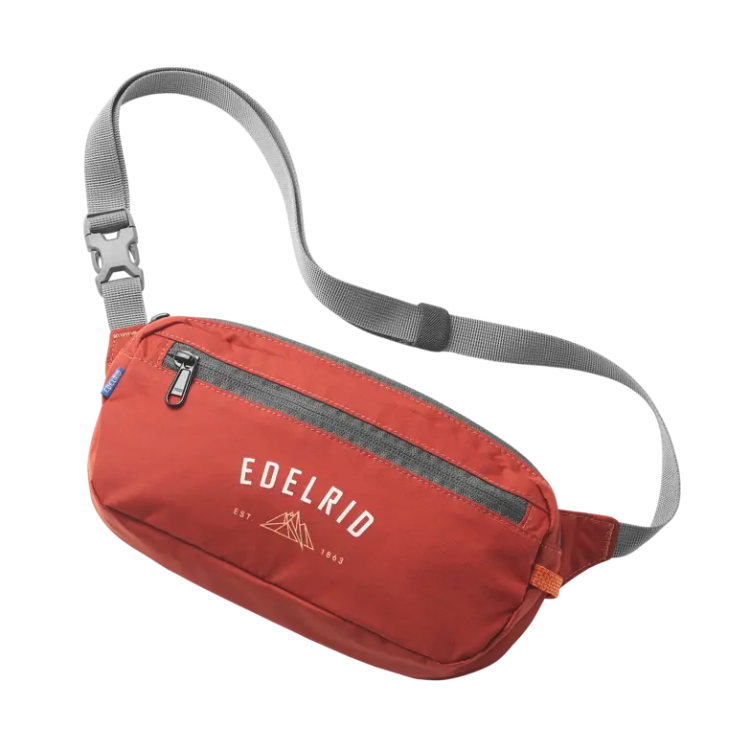 Red waist bag with gray strap on a white background, featuring Edelrid logo.