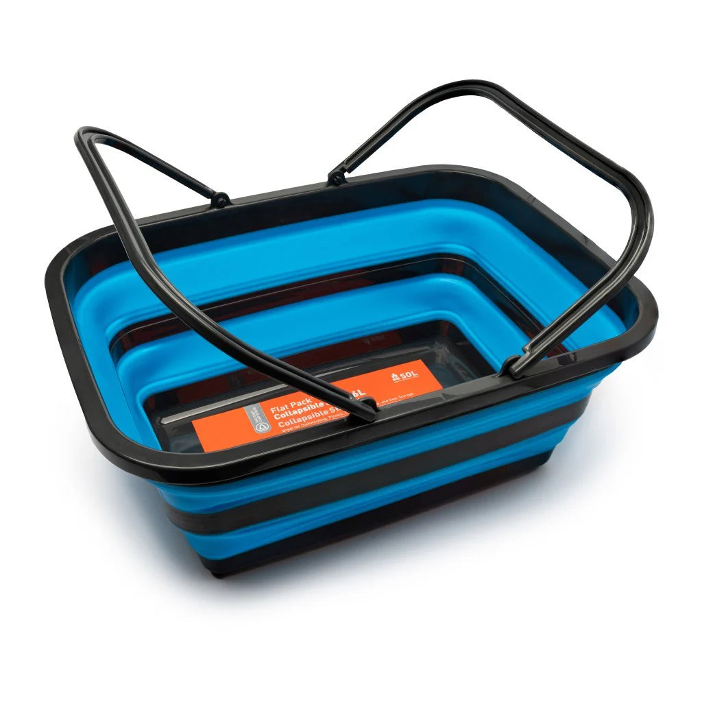 Blue collapsible basket with black handle on a white background