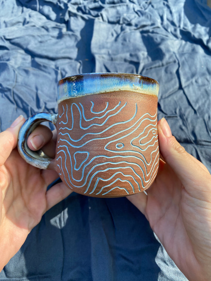 Tantalus Topo Mug