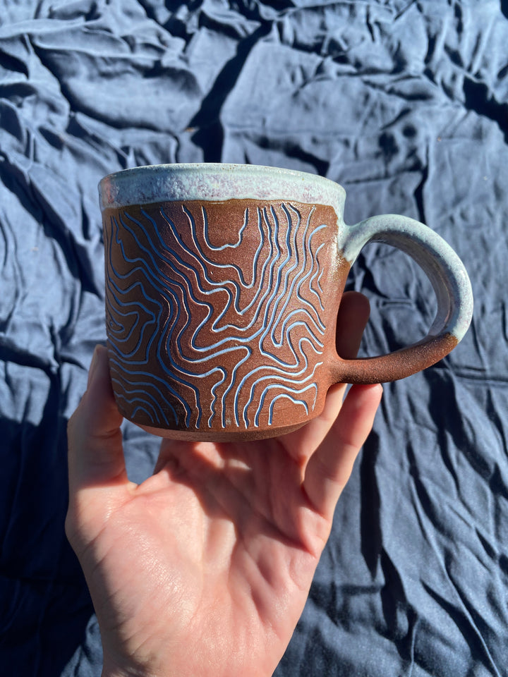 Tantalus Topo Mug